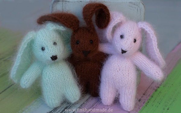 Knitted cuddly toy rabbit